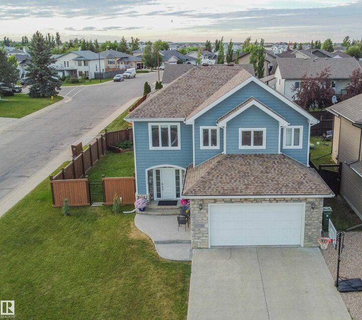 Property Photo: 3719 Lakeshore Drive AB T9N 0A4