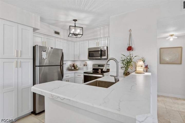 Property Photo: 13575 Eagle Ridge Drive 1214 FL 33912