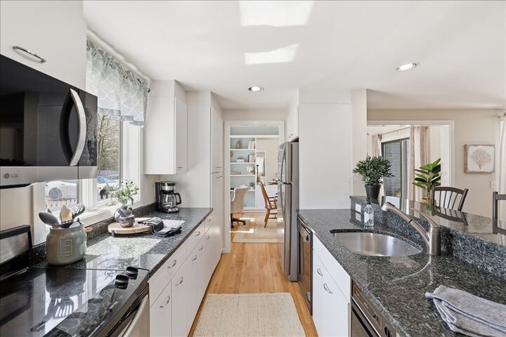 Property Photo:  100 Mid-Iron Way 7027  MA 02649 