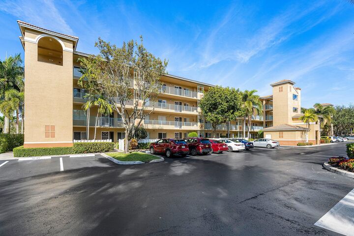 Property Photo:  5749 Gemstone Court 204  FL 33437 