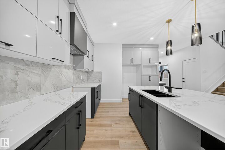 Property Photo: 6117 Crawford Drive SW AB T6W 4L7