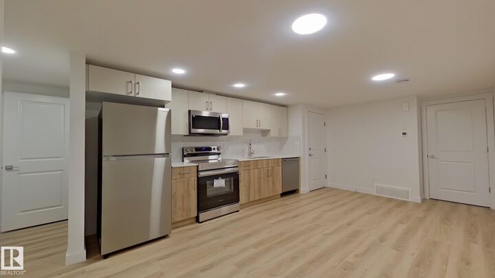 1037 Aster Boulevard NW Bsmt — photo 1