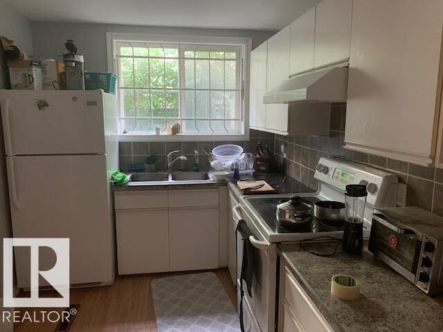 Property Photo: 10965 96 Street NW AB T5H 2K6
