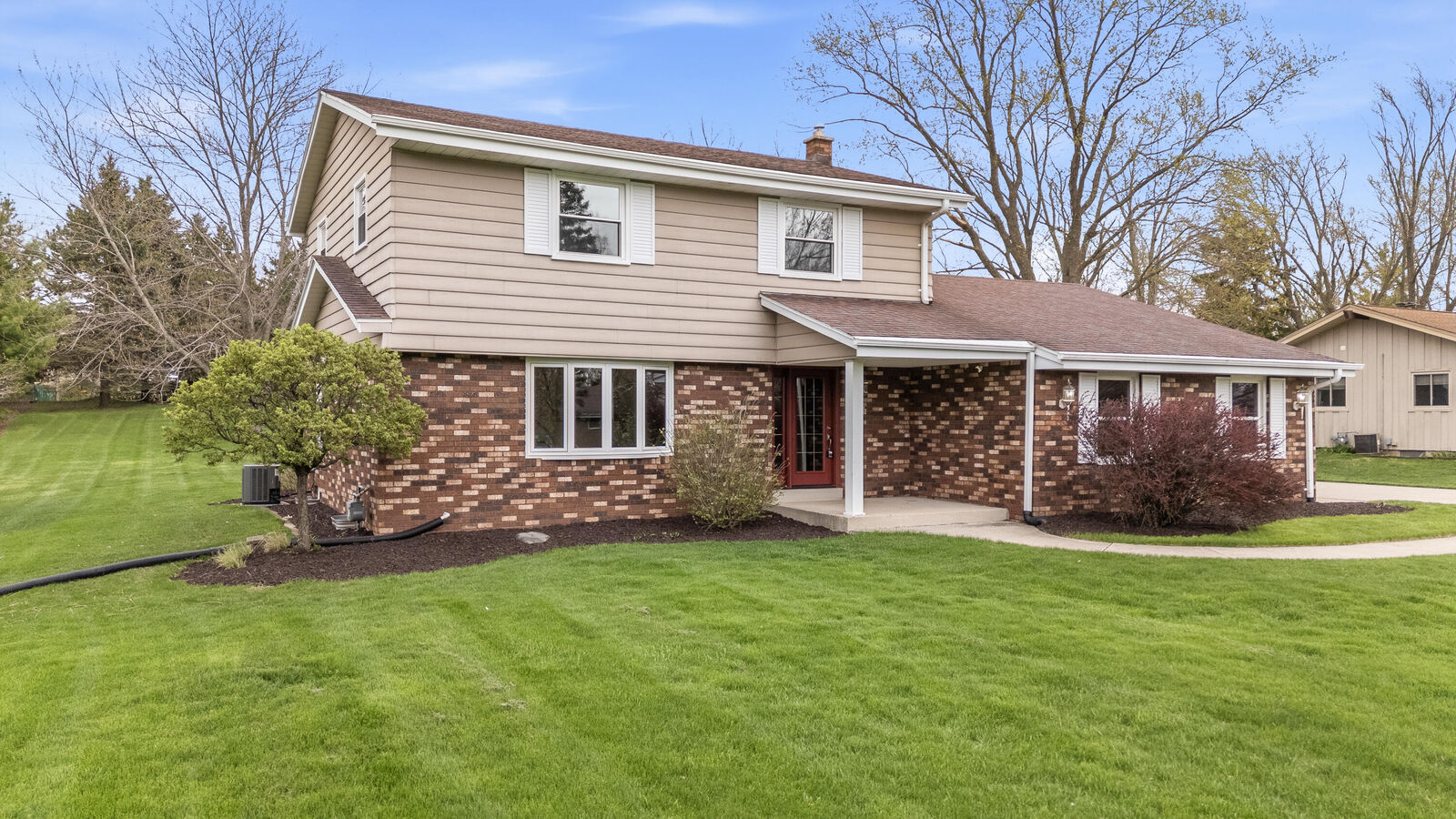 Property Photo:  W153n9830 Neptune Dr  WI 53022 