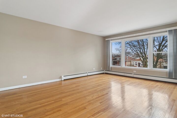 Property Photo: 1600 N 17th Avenue 1 IL 60160