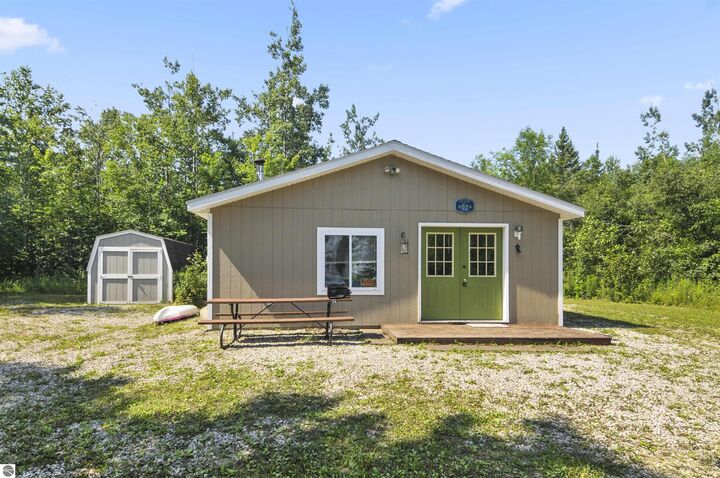 Property Photo:  22542 N US-23  MI 49759 