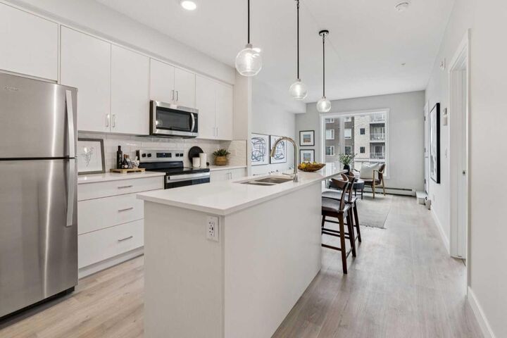Property Photo: 655 Shawnee Square SW 201 AB T2Y 1E3