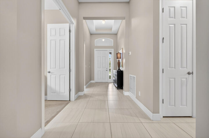 Property Photo: 8695 SW Carrara Way FL 34987