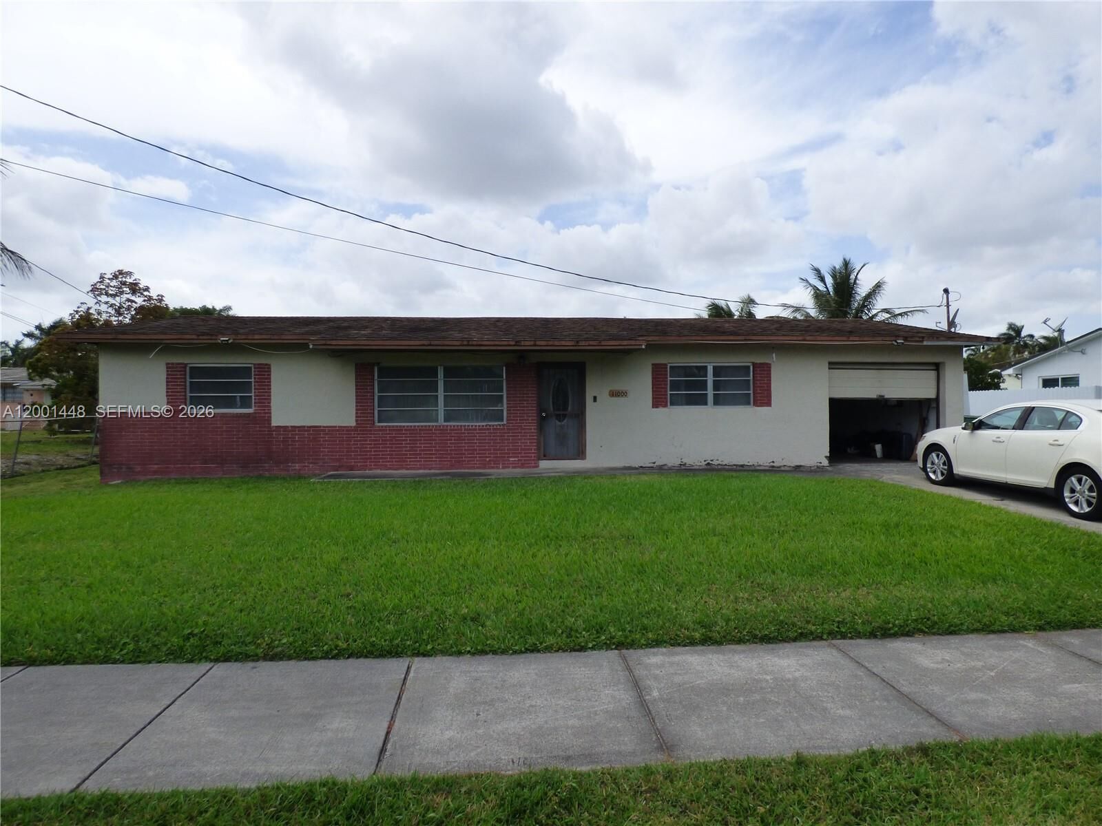 Property Photo: 11000 NW 21st Ct FL 33167