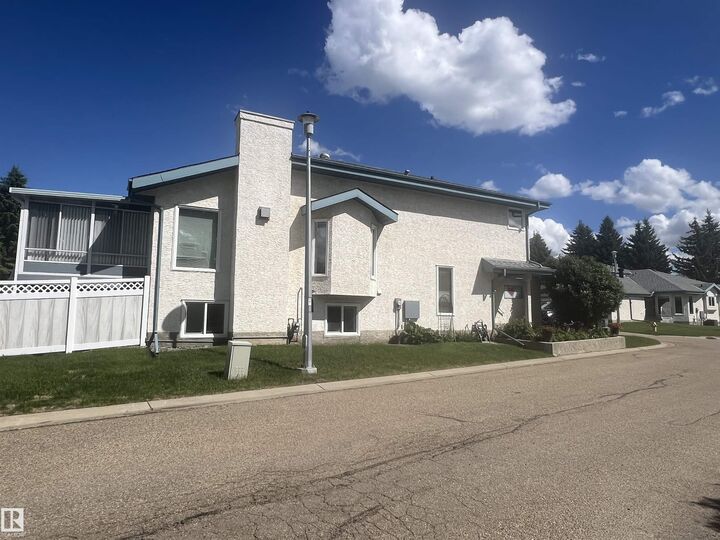 Property Photo: 85 Gervais Road 7 AB T8N 6H5