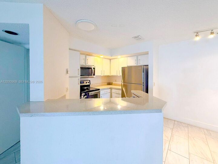 Property Photo:  3440 N Pinewalk Dr N 518  FL 33063 