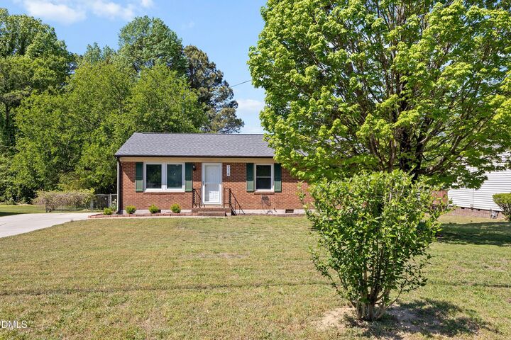 Property Photo:  718 S Hughes Street  NC 27502 