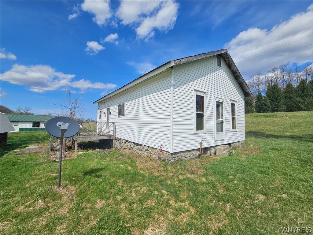 Property Photo:  7829 Jersey Hollow Road  NY 14755 