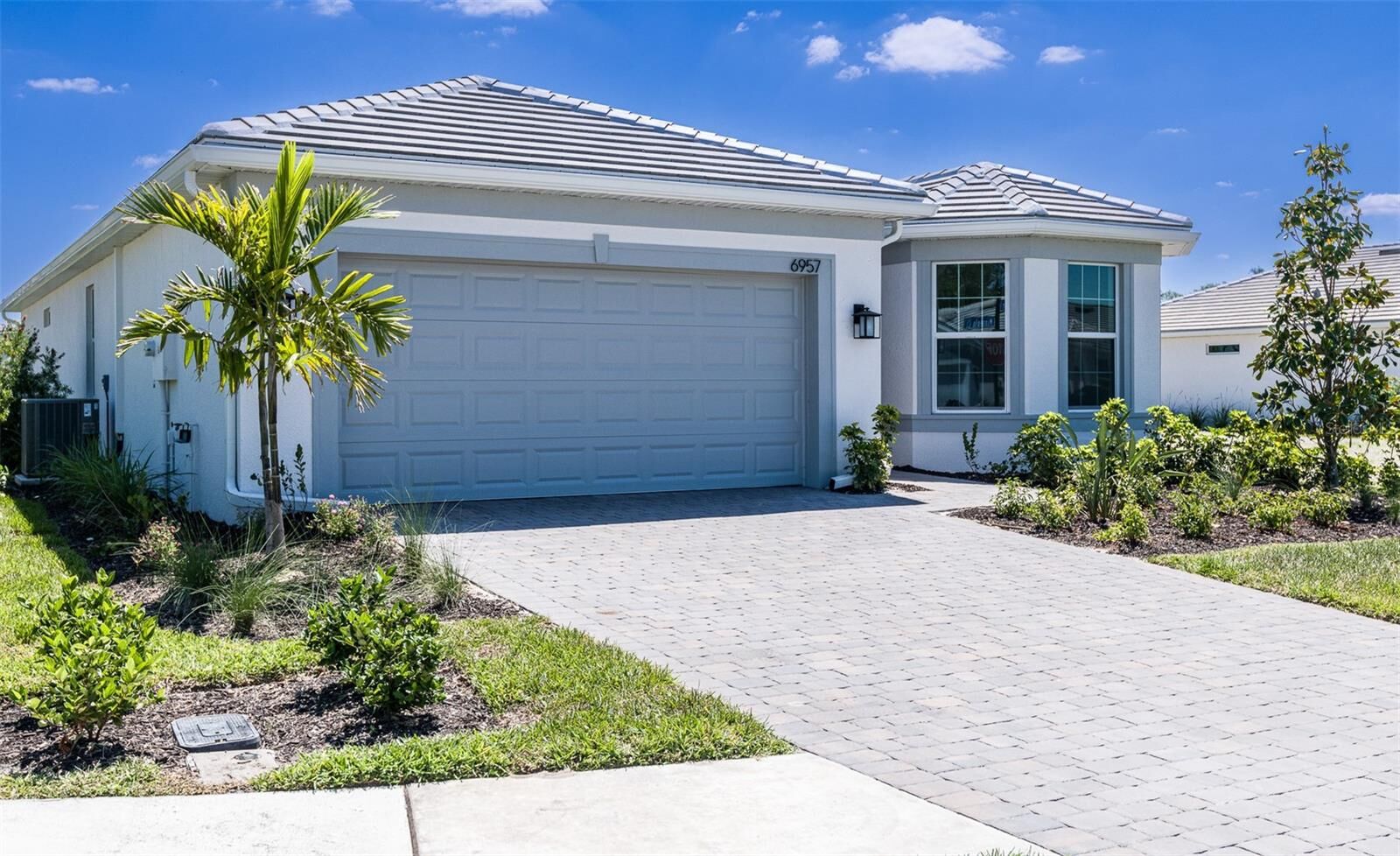 Property Photo:  6957 Honeybell Drive  FL 34275 