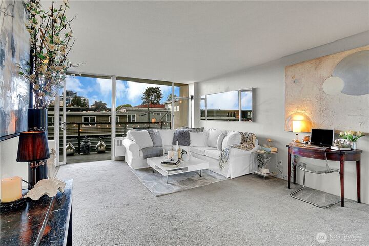 Property Photo:  2040  43rd Avenue E 215  WA 98122 