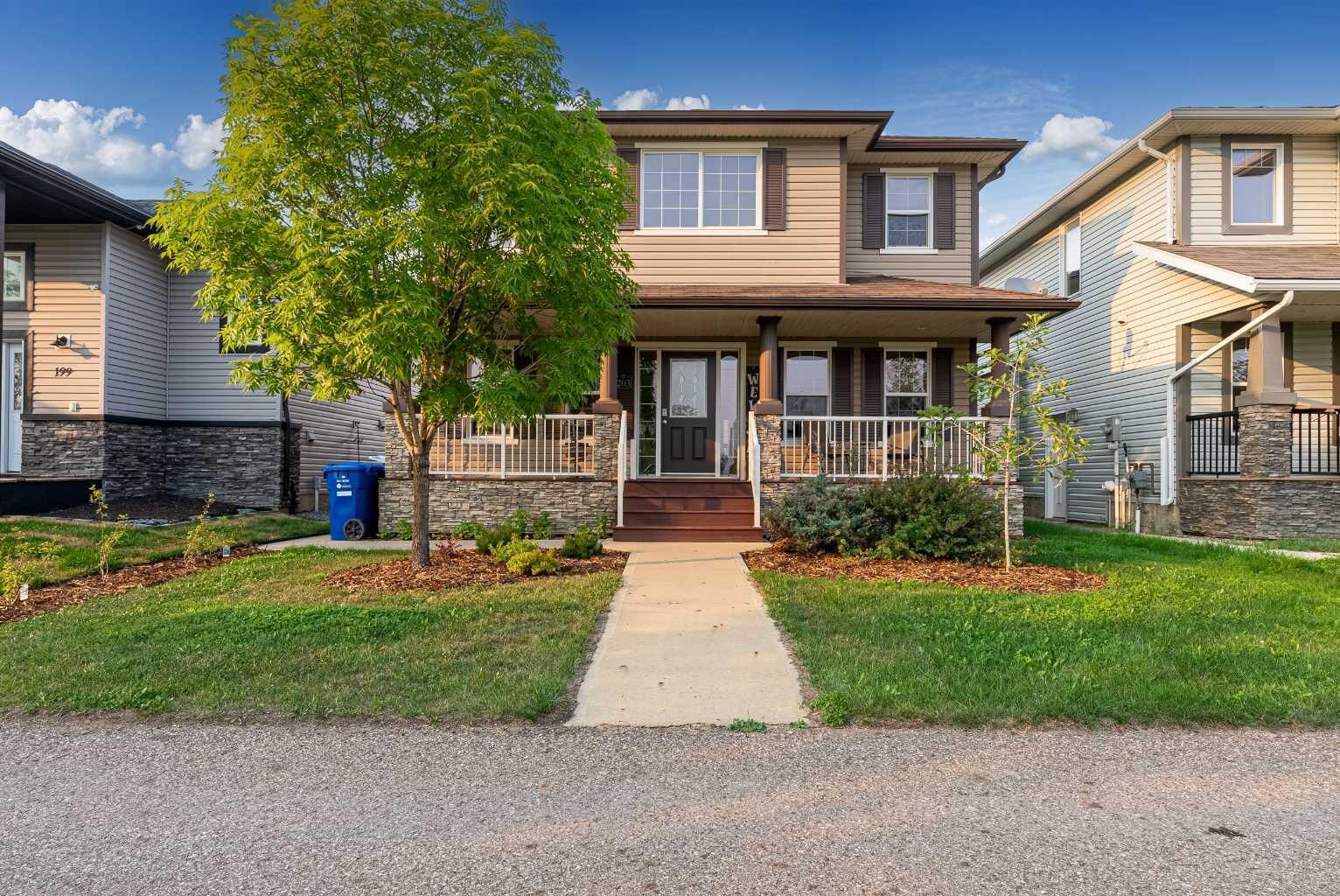 Property Photo:  203 Loutit Road  AB T9K 0L6 