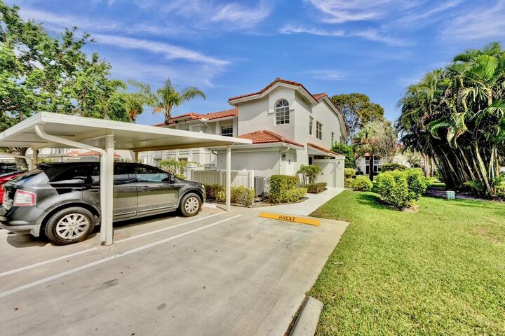 Property Photo:  7669 Springwater Place 202  FL 33437 