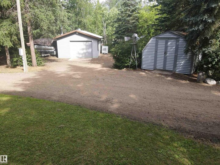Property Photo: 400 12272 Twp Rd 602 AB T0A 3C0