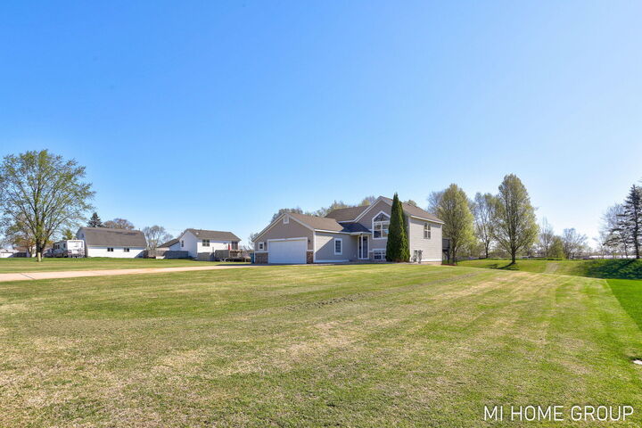 Property Photo:  3391 Heathridge Trail  MI 49419 