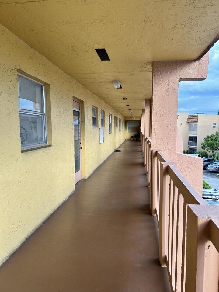 Property Photo:  6750 Royal Palm Boulevard 310E  FL 33063 