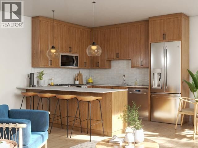 Property Photo:  202-5191 Manson Ave  BC V8A 3P2 