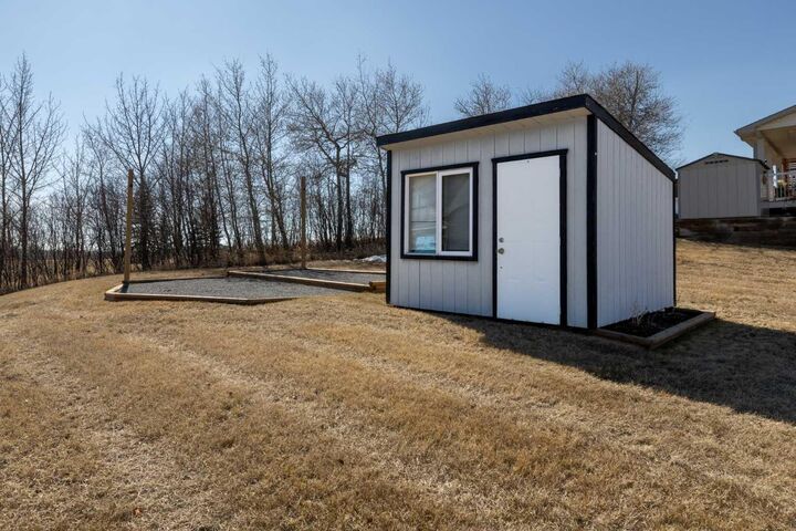 Property Photo:  25054 South Pine Lake Road 4070  AB T0M 1S0 