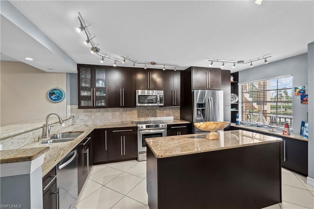 Property Photo:  5535 Rattlesnake Hamm Rd 205  FL 34113 
