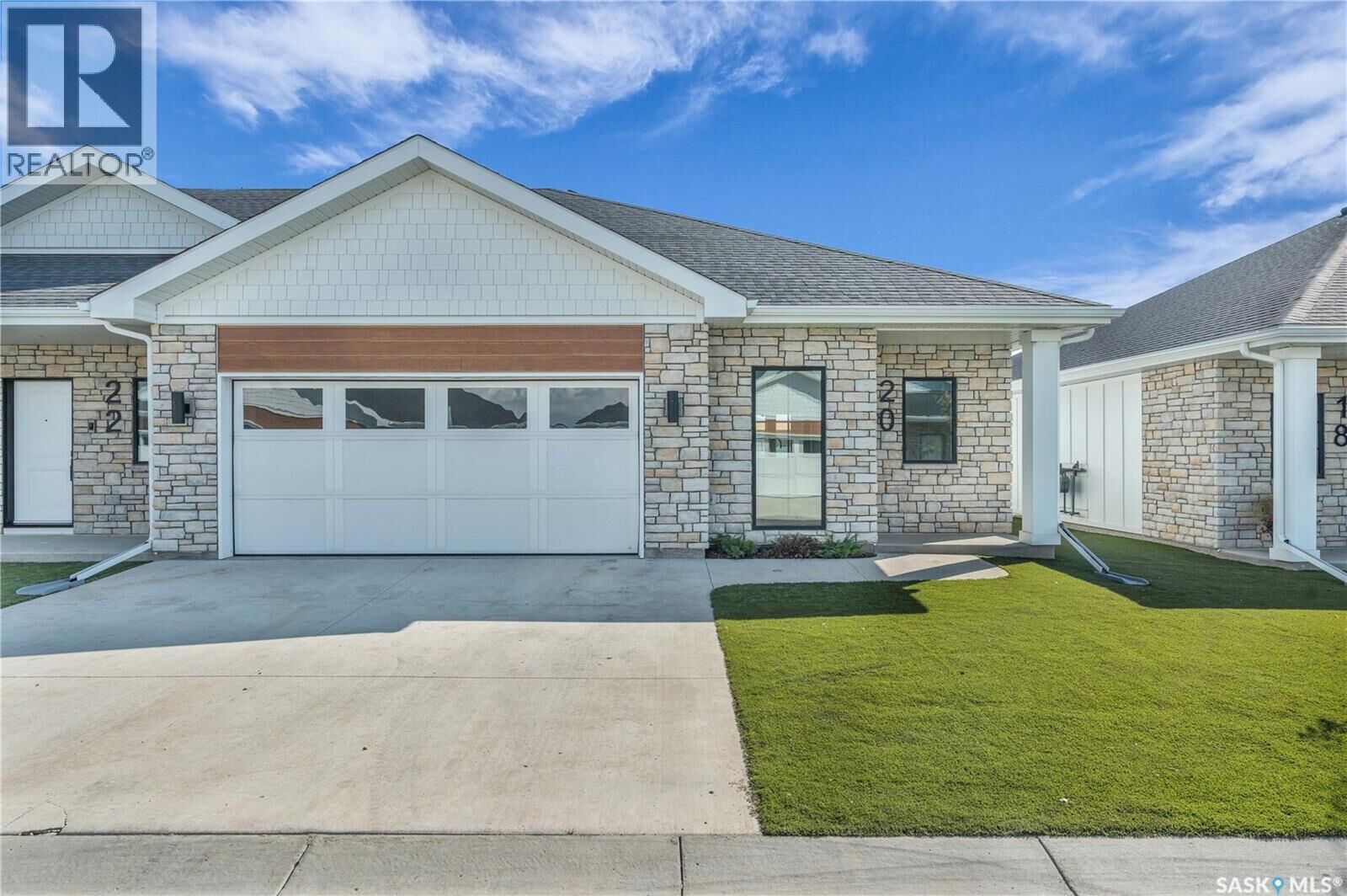 Property Photo:  6 720 Brighton Boulevard  SK S7V 1X1 