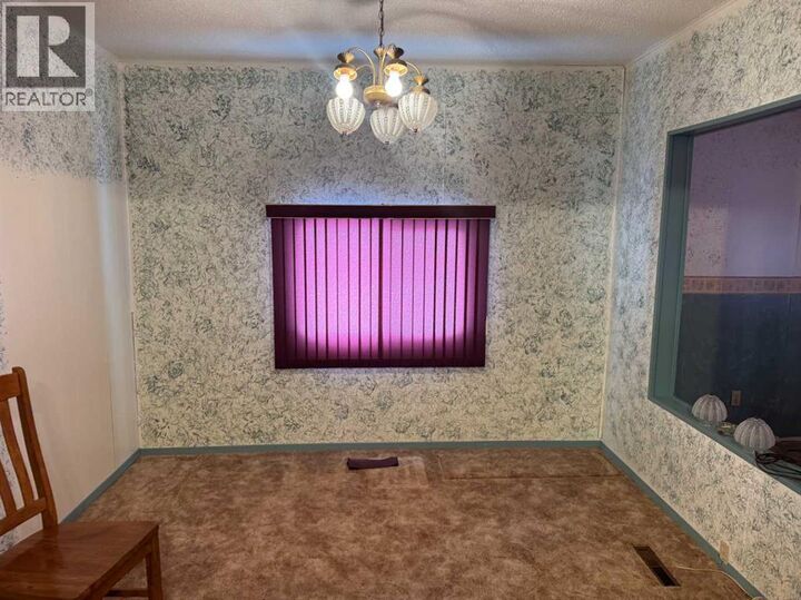 Property Photo: 61 Mackenzie Avenue AB T0B 2E0