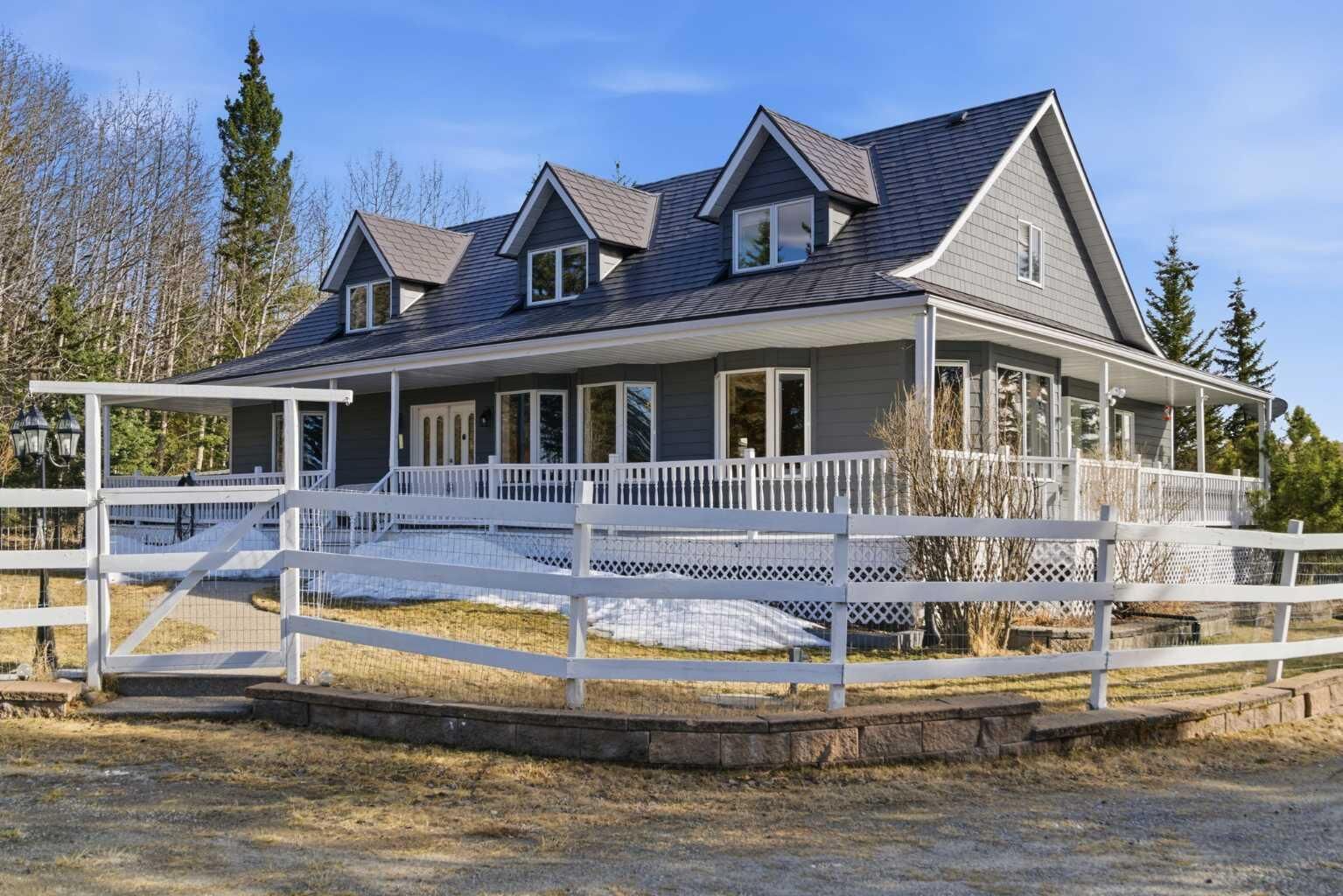 Property Photo: 273116 Grand Valley Road AB T4C 2W5