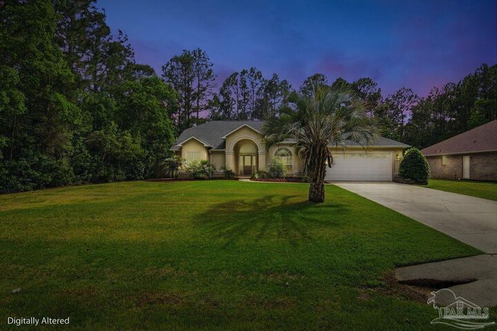 Property Photo:  7535 Corral Rd  FL 32583 