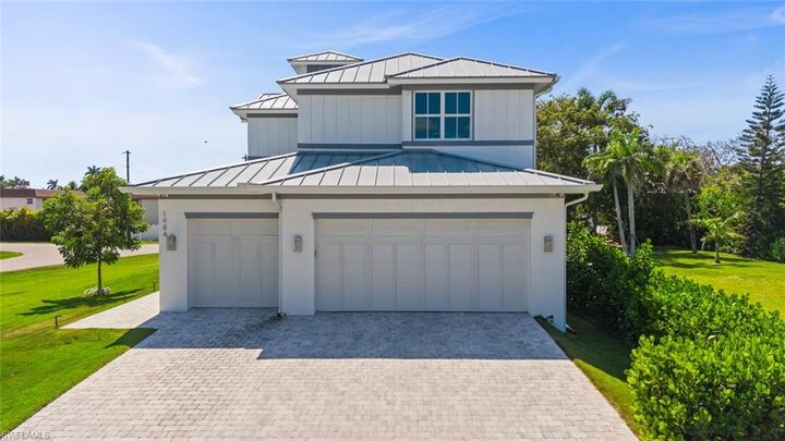 Property Photo:  1984 Frederick St  FL 34112 