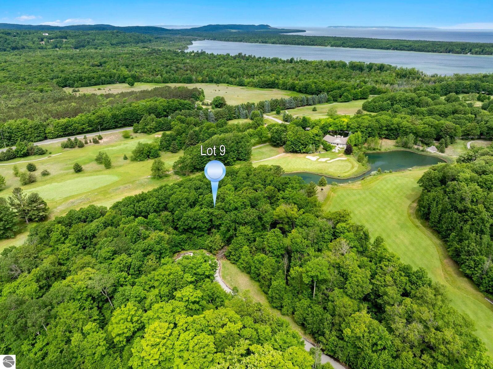 Property Photo:  9 S Club Drive  MI 49621 