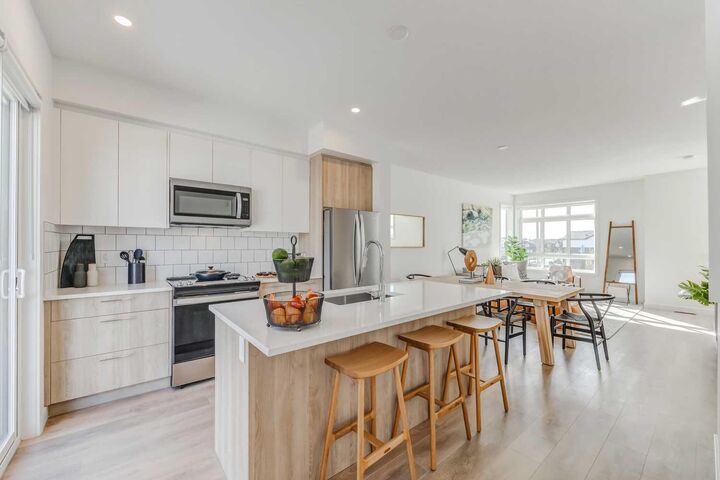 Property Photo: 857 Belmont Drive SW 213 AB T2X 4P2
