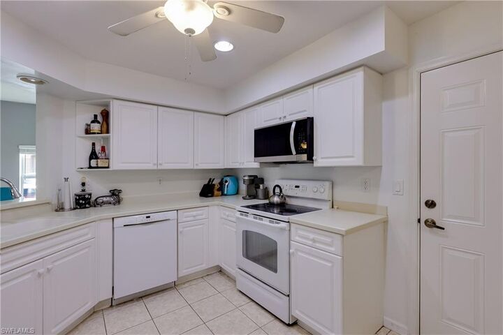 Property Photo: 25080 Peacock Ln 102 FL 34114