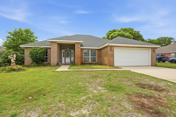 Property Photo:  100 Marimba Street  FL 32569 