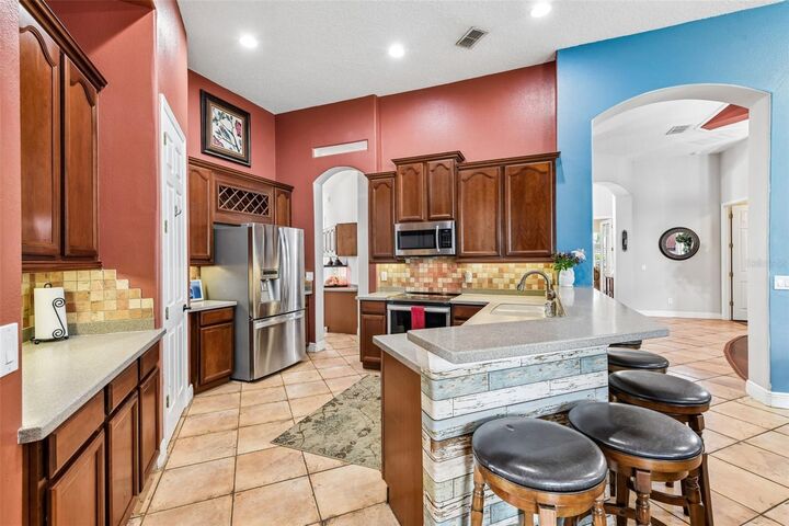 Property Photo:  910 Parasol Place  FL 32766 