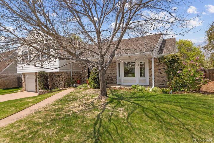 Property Photo:  7409 S Newport Way  CO 80112 