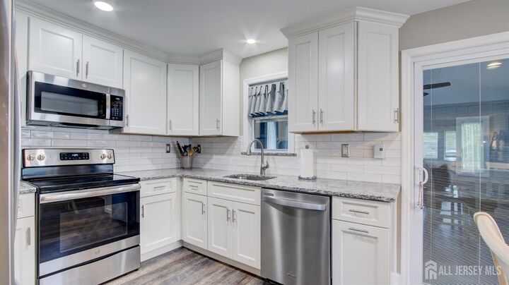 Property Photo:  56 Essex Road  NJ 08831 
