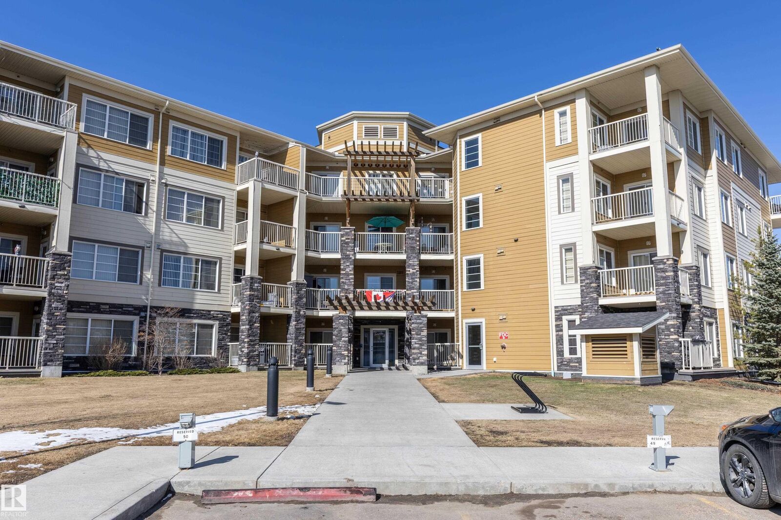 Property Photo: 3670 139 Avenue NW 107 AB T5Y 3N5