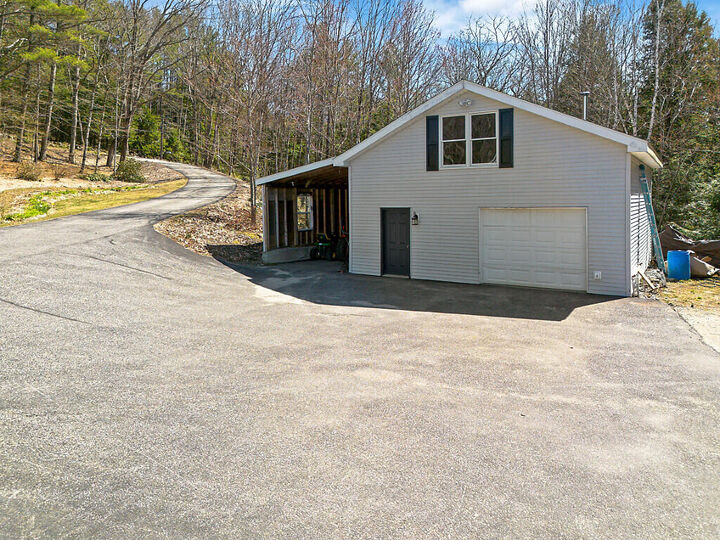 Property Photo:  559 Sandy River Road  ME 04349 