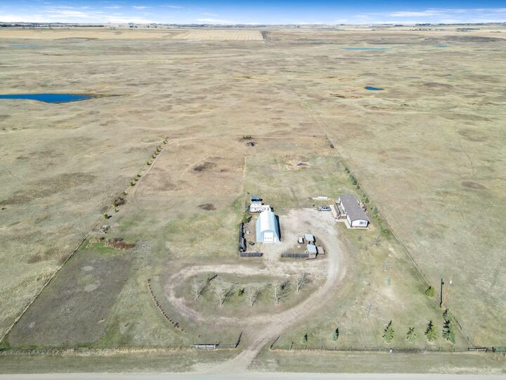 Property Photo: 232080 Range Road 250 AB T1P 1J6