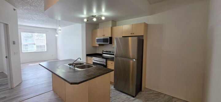 Property Photo:  73 Erin Woods Court SE 1206  AB T2B 3V2 