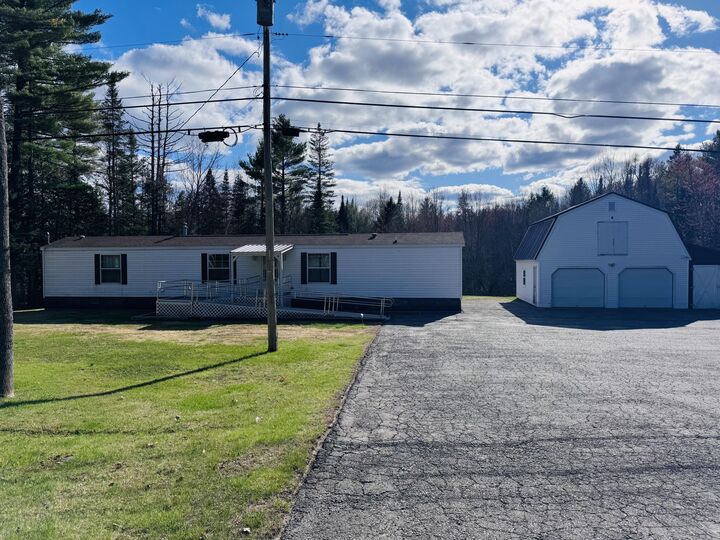 Property Photo:  1676 Hudson Road  ME 04449 