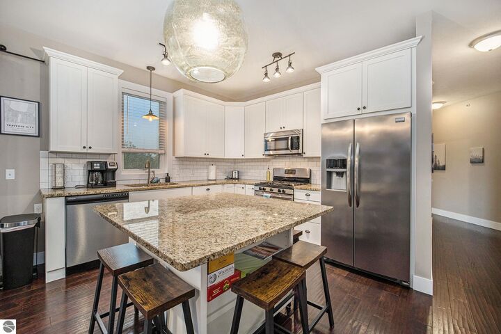 Property Photo:  115 E Eighth Street 16  MI 49684 