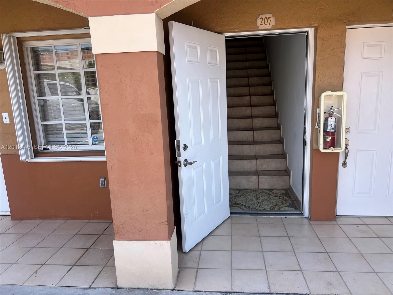 Property Photo:  2425 W 76th St 207  FL 33016 