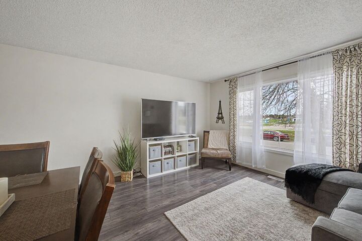 Property Photo:  359 Woodvale Crescent SW  AB T2W 3L3 