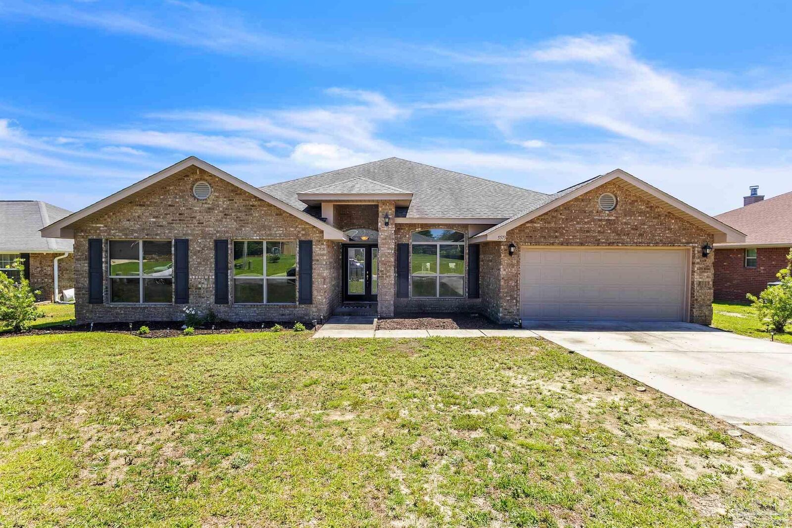 Property Photo: 5573 Hannah St FL 32570