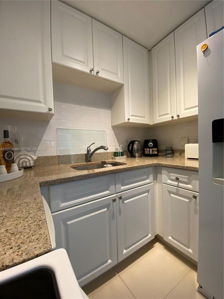 Property Photo:  5050 NW 7th St 312  FL 33126 
