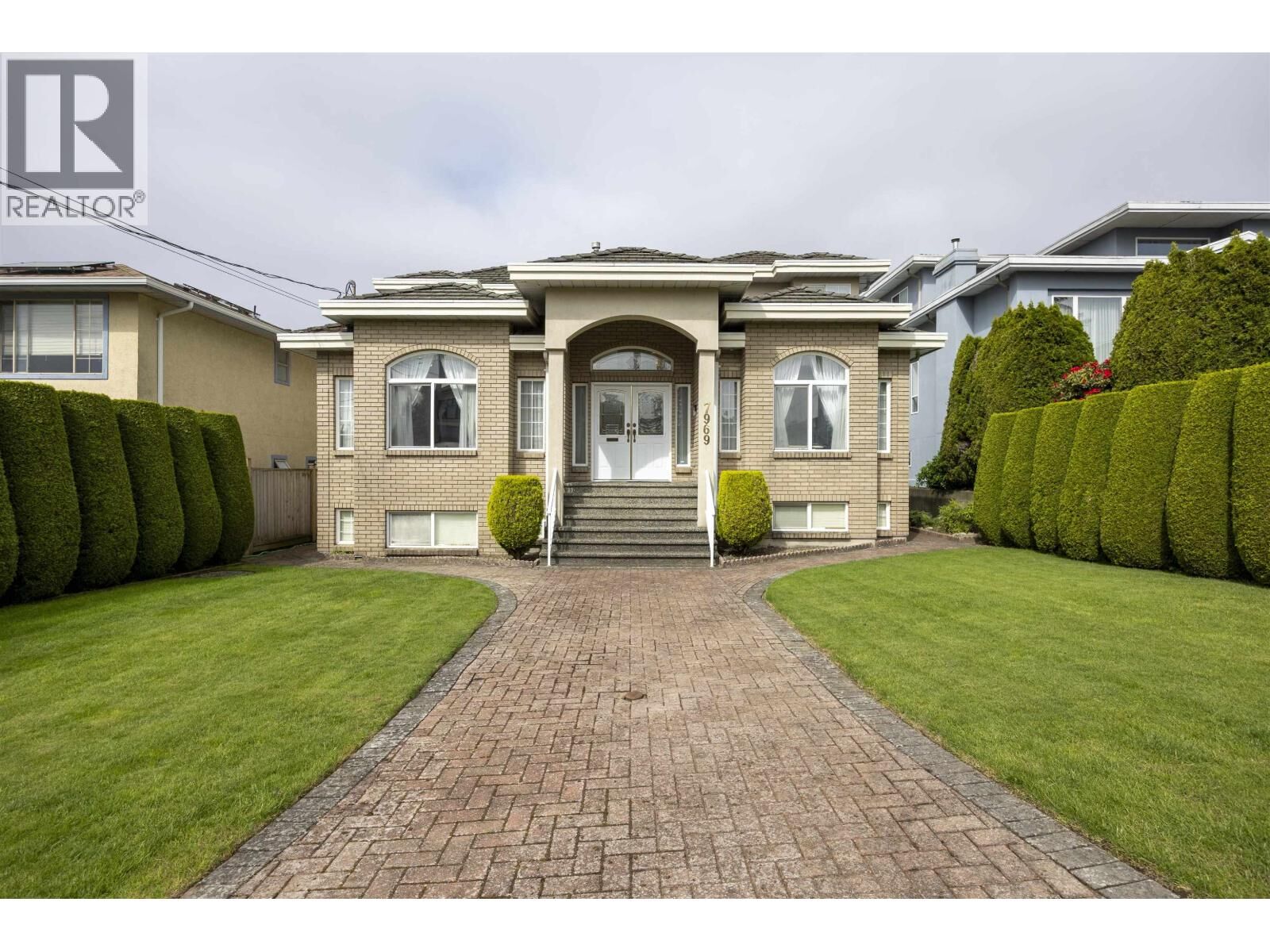 Property Photo:  7969 Macpherson Avenue  BC V5J 4P4 